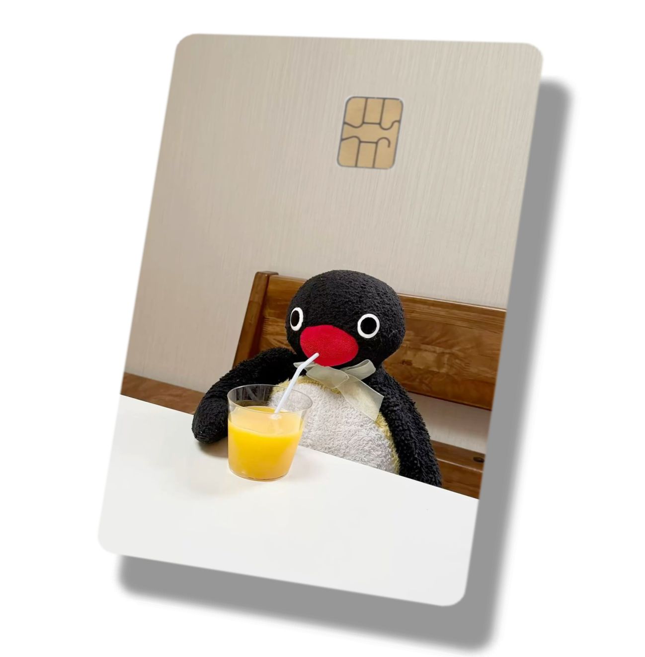 Penguin Drinking Orange Juice