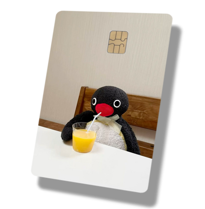 Penguin Drinking Orange Juice