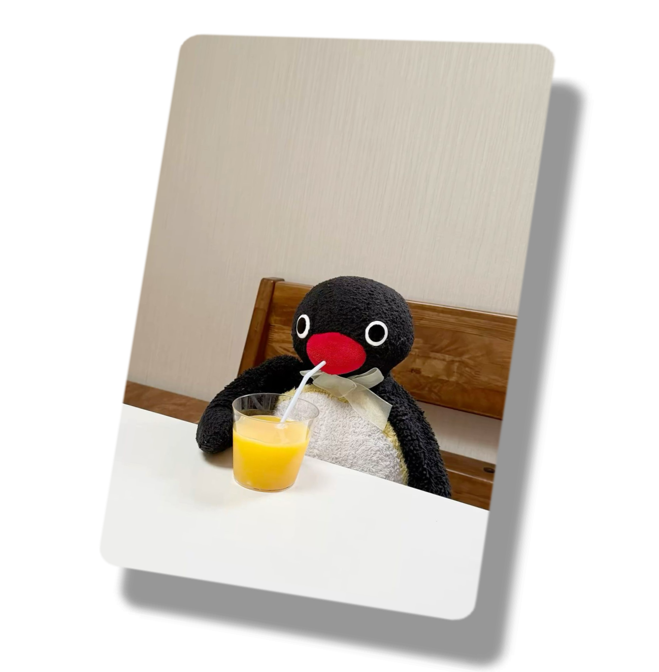 Penguin Drinking Orange Juice