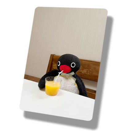 Penguin Drinking Orange Juice